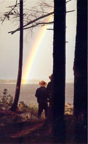 rainbow and campers on the St Croix River in eastern Maine in October 1999