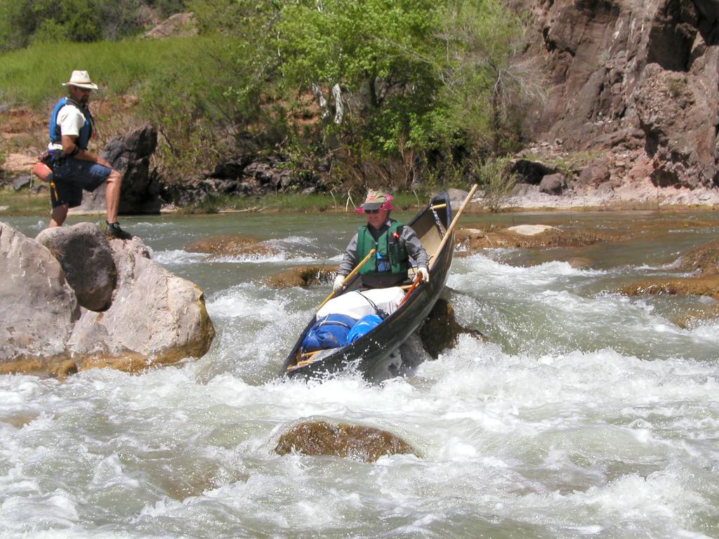 canoeing over a tricky part of the Verde River in Arizona in April 2003