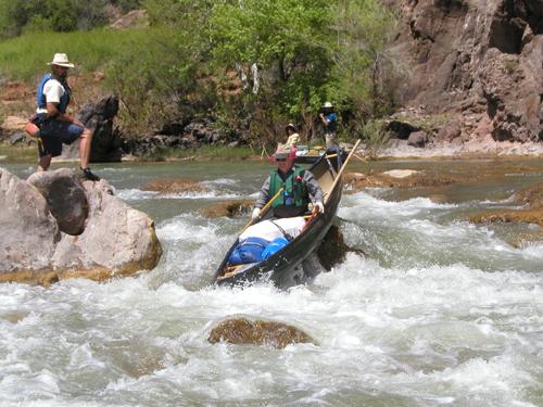 canoeing over a tricky part of the Verde River in Arizona in April 2003