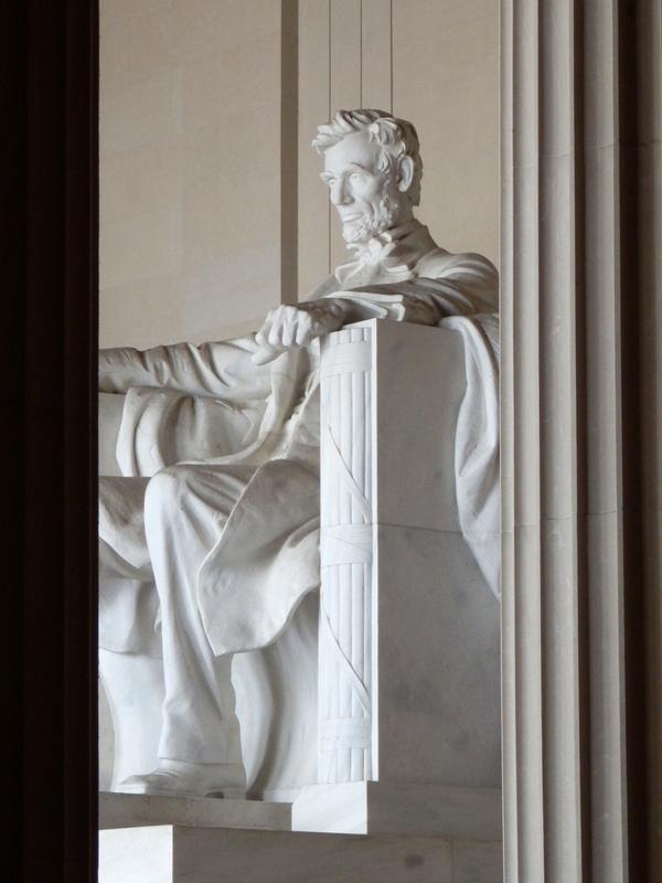 statue at the center of Lincoln Memorial in Washington DC