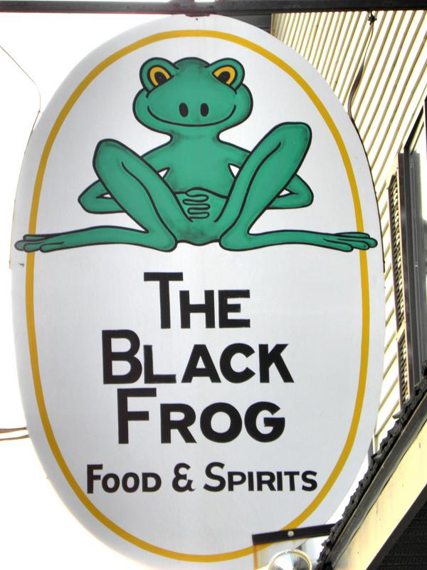 sign for The Black Frog restaurant in Greenville, Maine