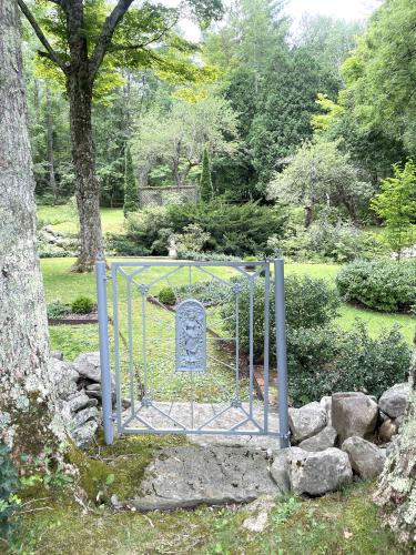 gate in August at Ashintully Gardens in western MA