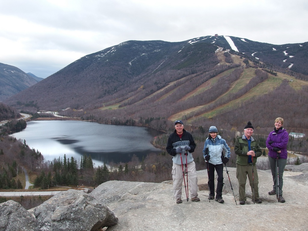 Len, Susan, Charlie and Gwen on Artists Bluff in New Hampshire 
with Franconia Notch, Echo Lake and Cannon Mountain in the background