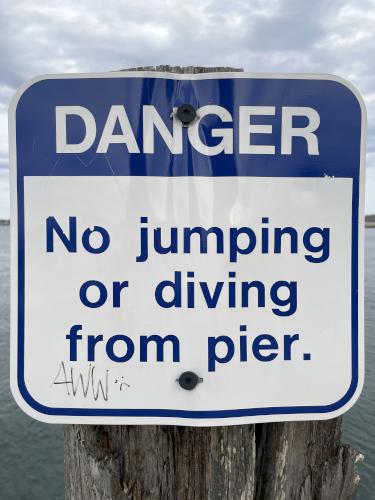 warning sign in May at Bug Light near Portland in southern Maine