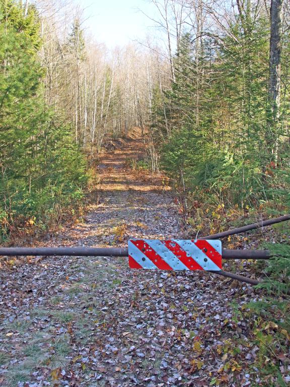 shot up entrance gate to the snowmobile trail at Cilley Northwest Mount in New Hampshire