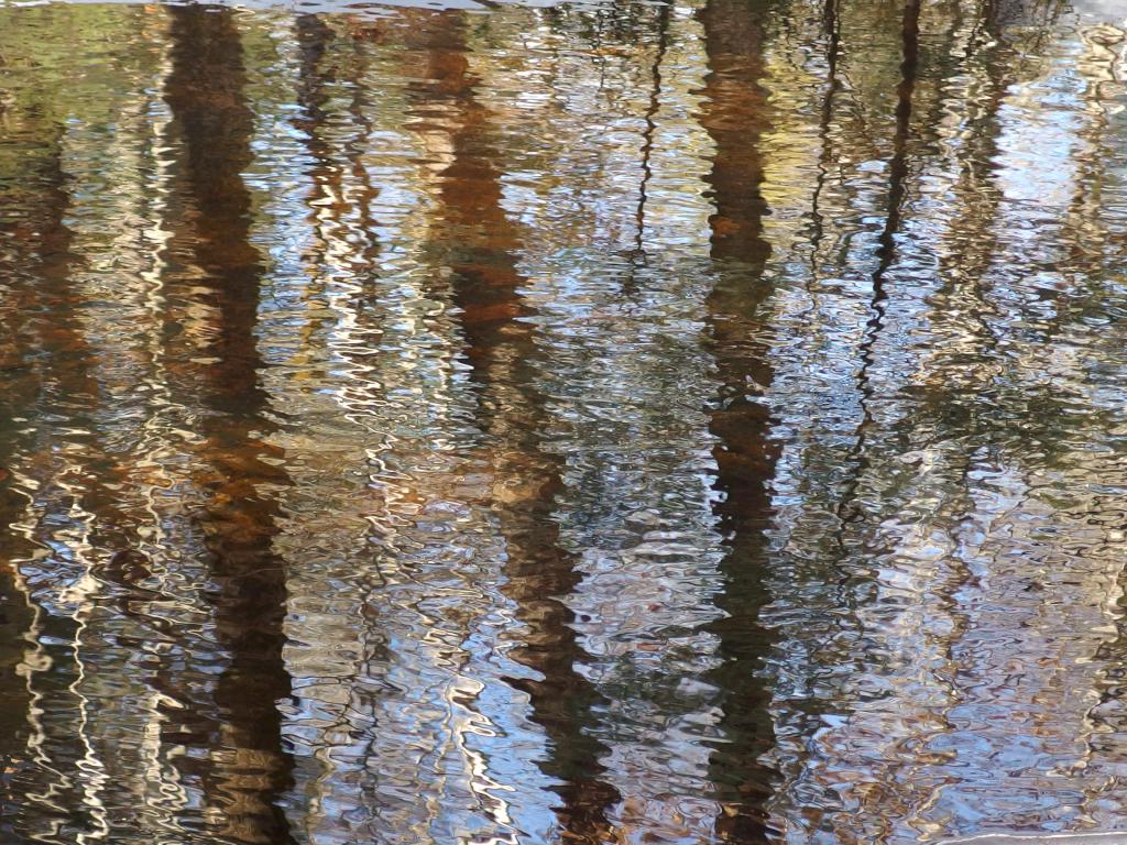 modern-art reflection on Kelly Brook in February at Darby Brook Conservation Area in New Hampshire