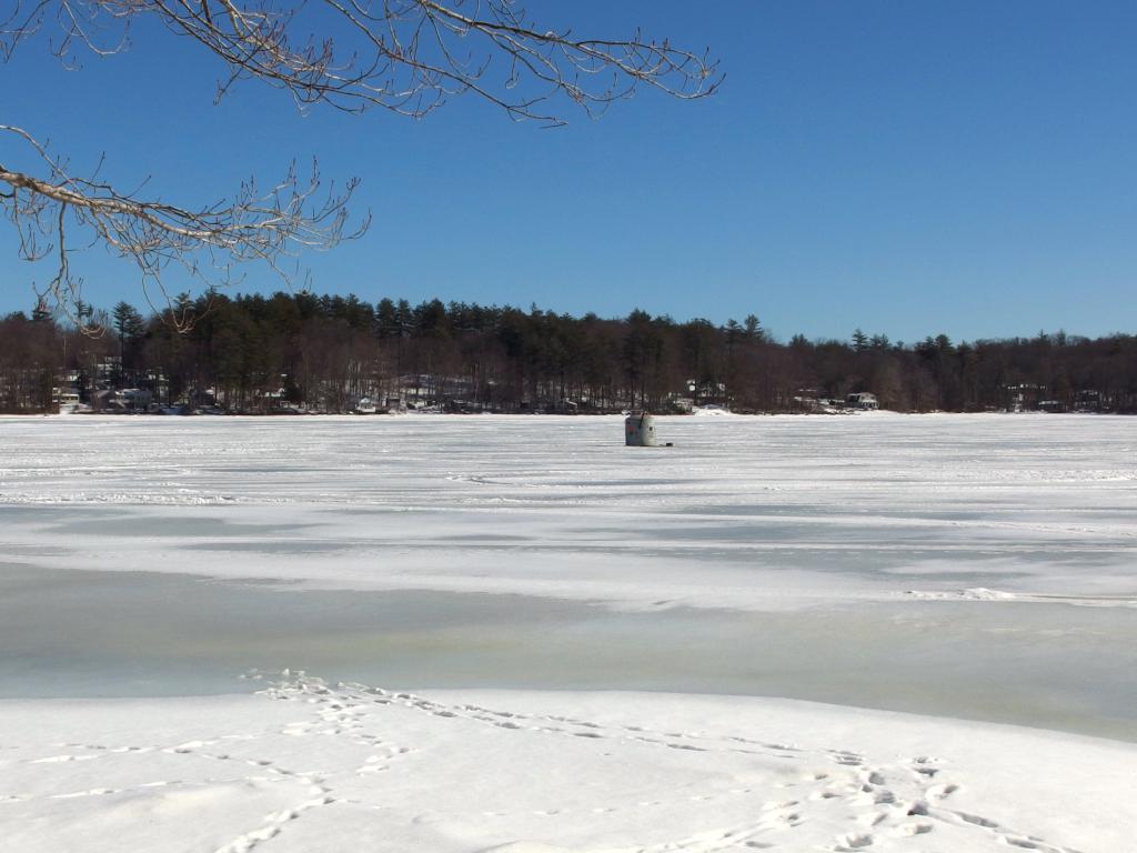 fishing hut in February on Onway Lake at Dearborn Forest in southern New Hampshire