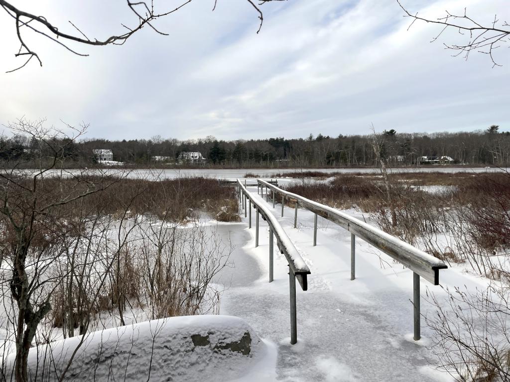 wooden pier and observation platform in January at Grassy Pond Conservation Land in northeast MA