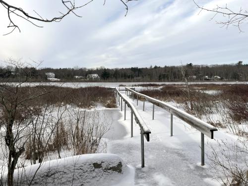 wooden pier and observation platform in January at Grassy Pond Conservation Land in northeast MA