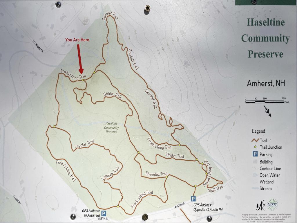 map in December at a trail intersection of the Haseltine Community Preserve in southern NH