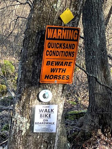 boardwalk sign in December at McDowell/Van Leer Land near Hazel Brook in eastern MA