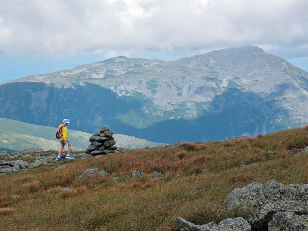 Carl hikes up the Gulfside Trail with Mount Adams as a backdrop on the way to Mount Washington in New Hampshire