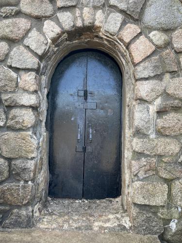 stone tower door in February on Burrill Hill at Lynn Woods Reservation in northeast Massachusetts