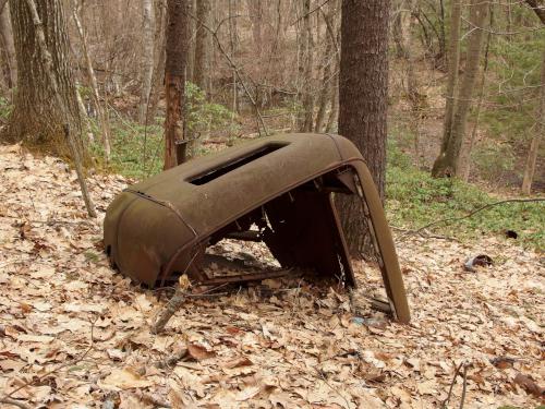 old truck beside the trail at Melendy Pond Land in Brookline, New Hampshire