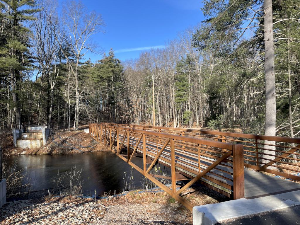 new boardwalk in December crossing the Nashua Power Canal at Mine Falls Park in Nashua NH