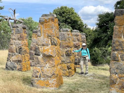 Andee at the water tower ruin in July on Misery Island in northeast MA