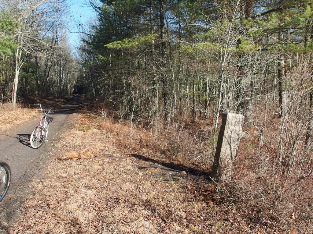 state-line marker on the Monadnock Recreational Rail Trail near Jaffrey in southern New Hampshire