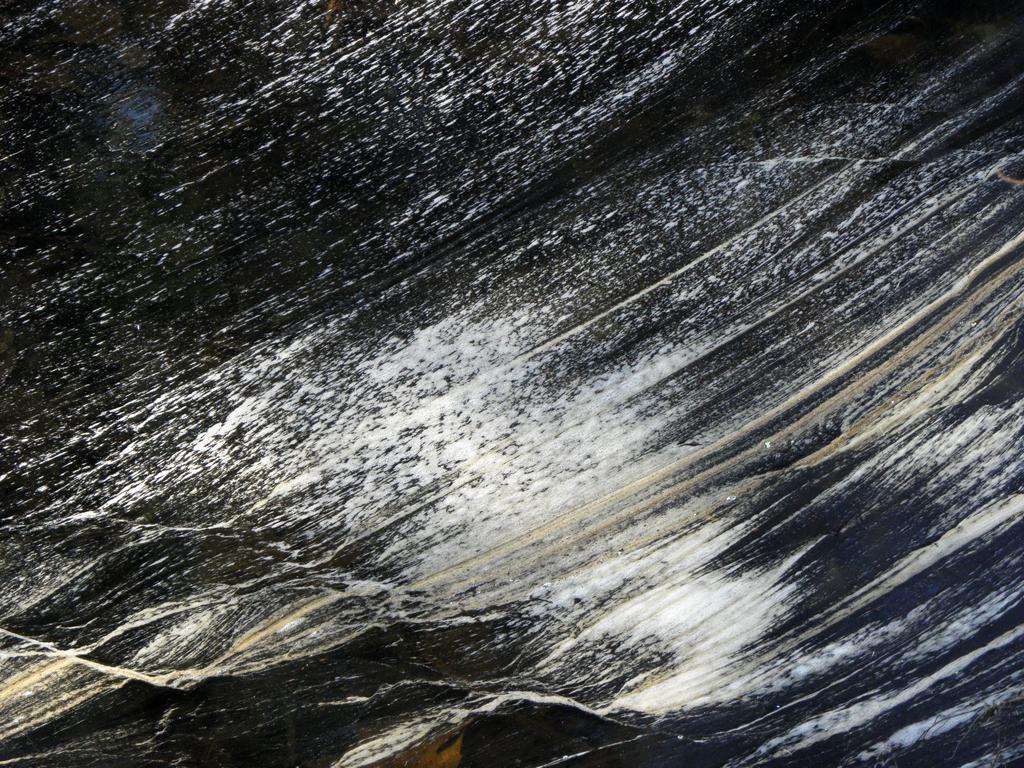 artistic water pattern beside the trail to South Pawtuckaway Mountain in New Hampshire