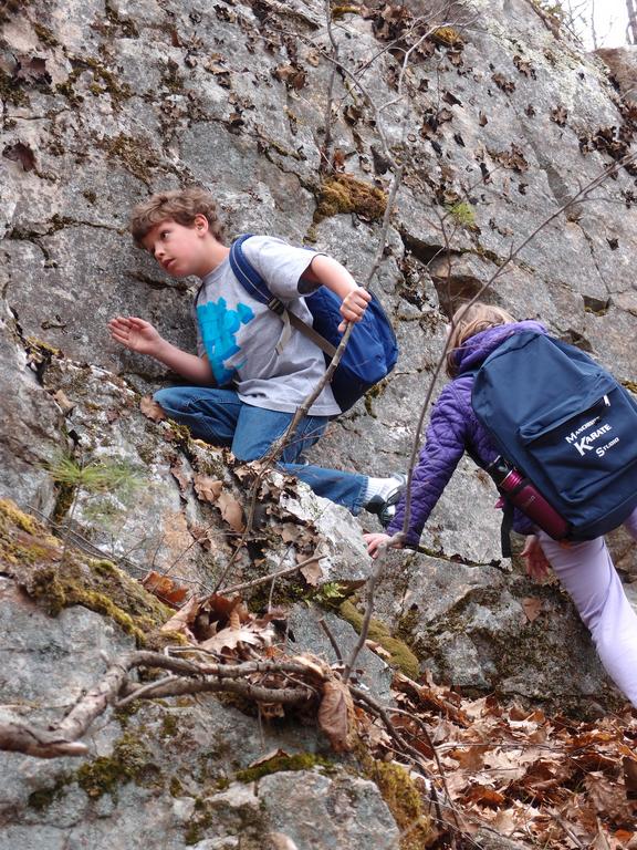 Garrett and Talia bushwhack up Hooksett Pinnacle in southern New Hampshire