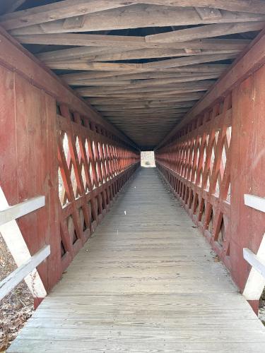 covered bridge in December at Lake Potanipo Trail near Brookline in southern NH