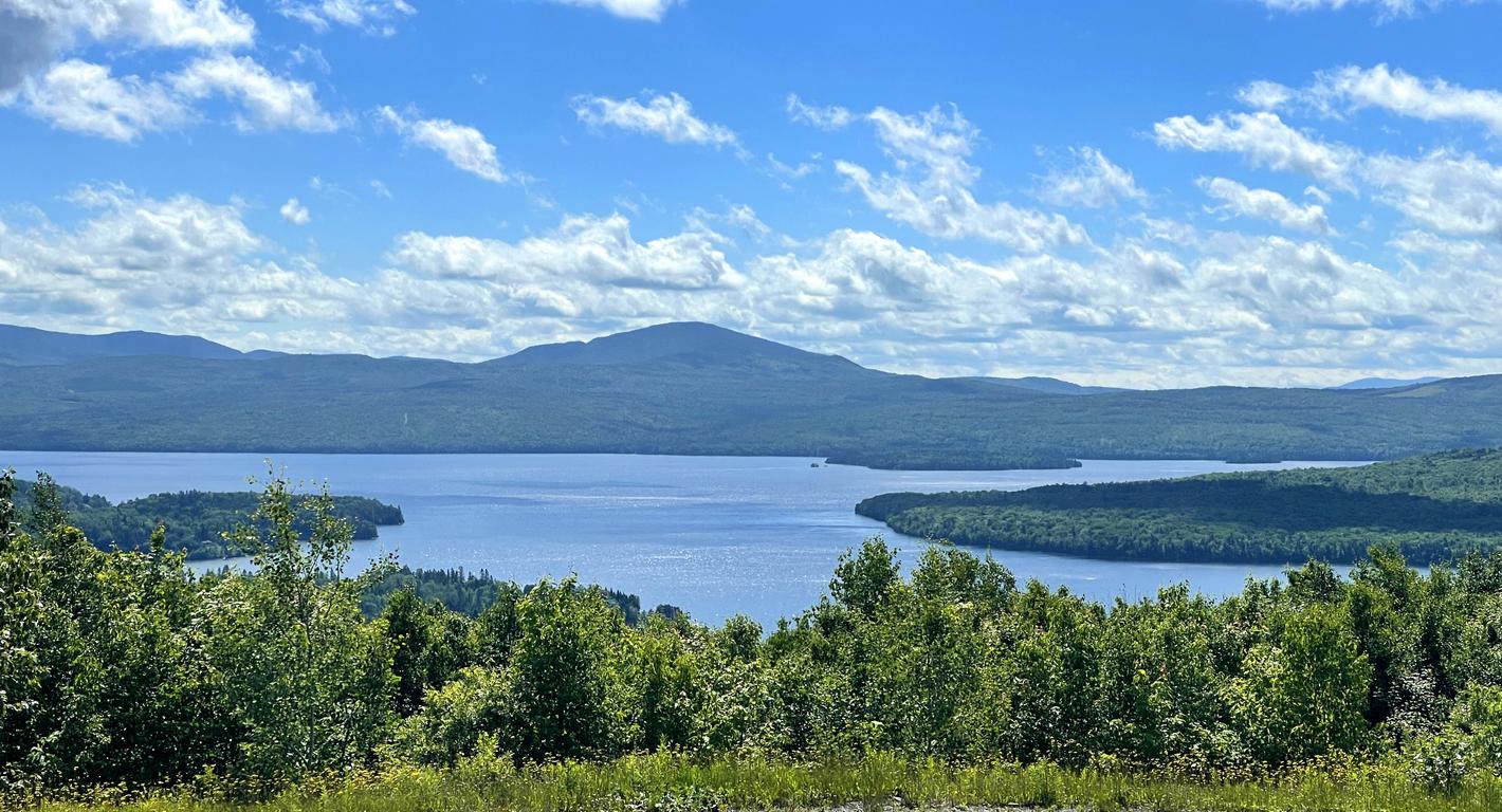 view east over First Connecticut Lake toward Magalloway Mountain in June from Prospect Mountain in northern New Hampshire