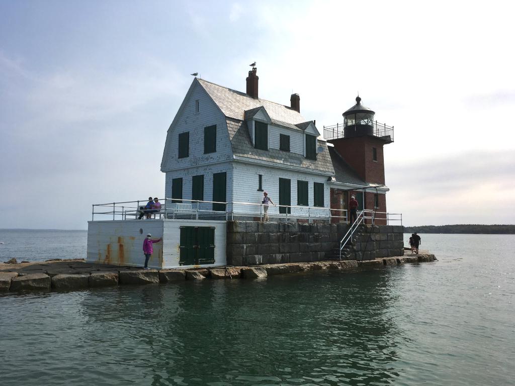 Rockland Lighthouse in September at the far end of Rockland Breakwater in Maine