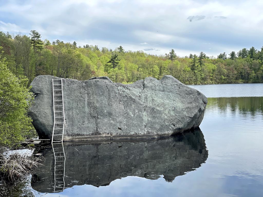 boulder in May at Rocky Pond near Boylston, MA