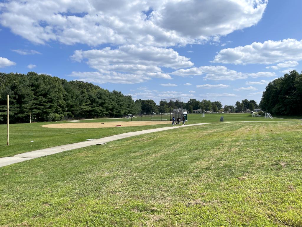 view of playing fields in August at Roussel Field and River Walk in Nashua NH