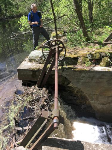 Fred checks the waterflow outlet near Thanksgiving Forest near Chelmsford in northeastern MA