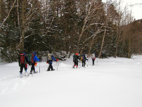 winter hikers on Little River in New Hampshire