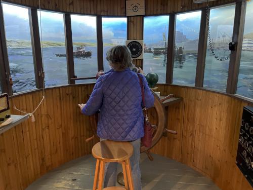 Andee in the Tug Boat Pilot House Replica at the Maine Maritime Museum in Bath ME