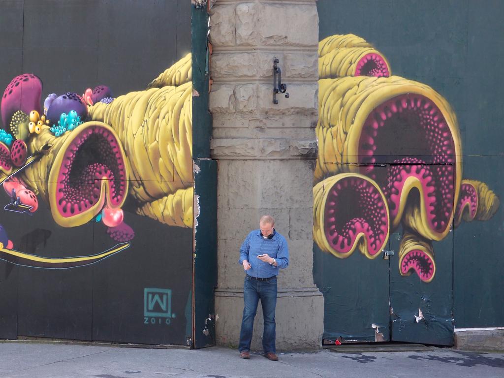 creative mural on an under-construction downtown street corner at Seattle in Washington